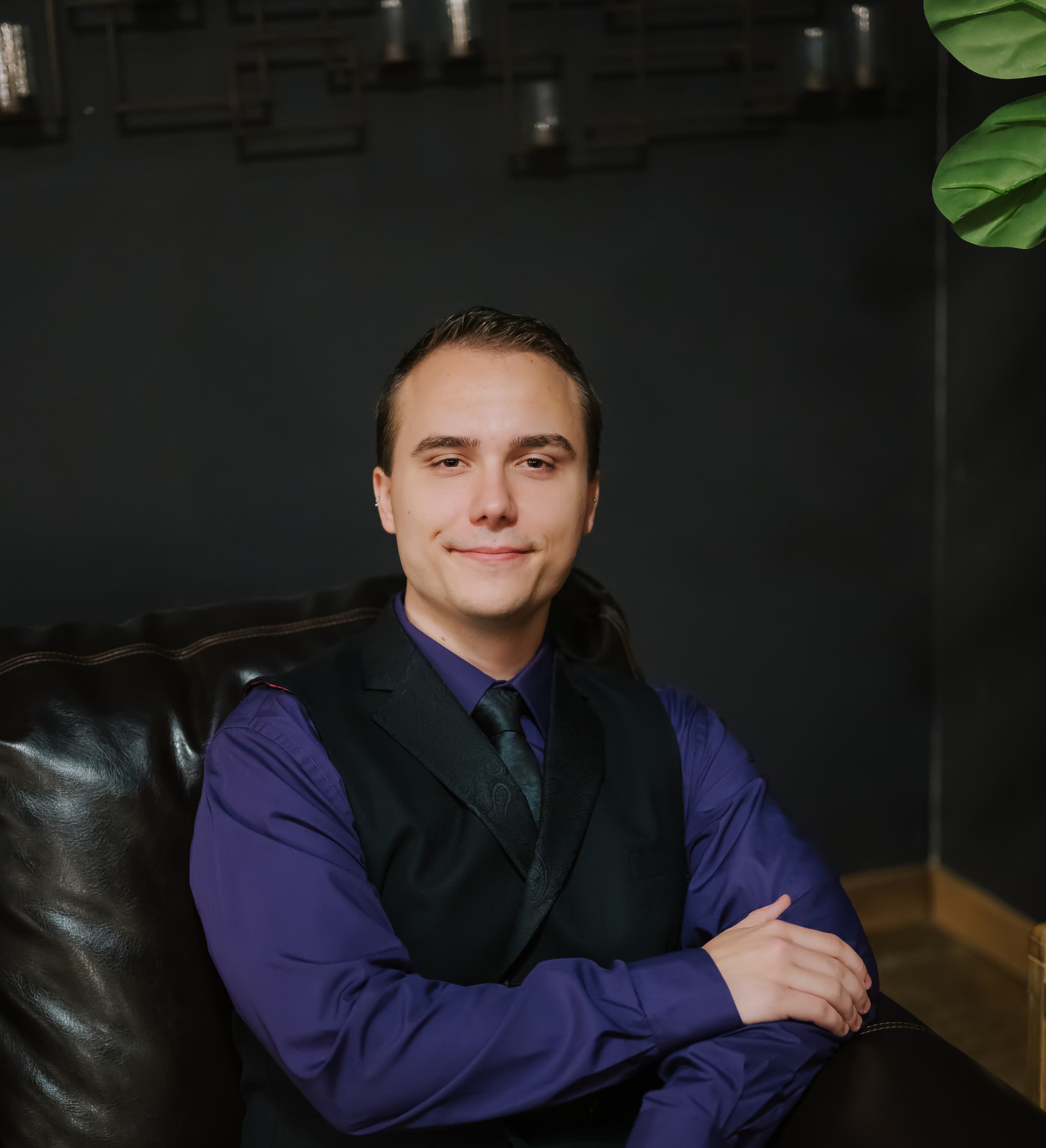 Professional headshot of the tutor